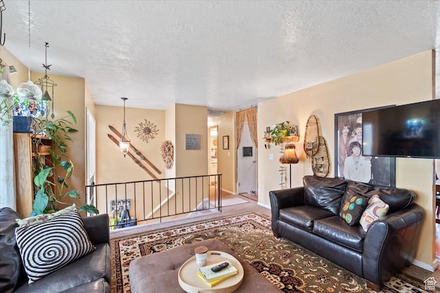 3275 N 250 E, North Ogden, UT 84414 - living room featuring carpet floors, a textured ceiling, and baseboards