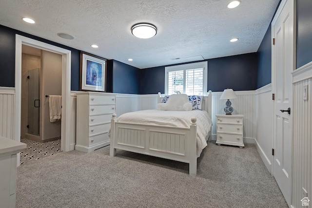 963 E Old English Rd, Draper, UT 84020 - carpeted bedroom with wainscoting, a textured ceiling, and a decorative wall