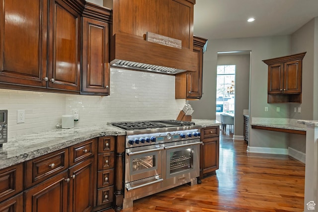 963 E Old English Rd, Draper, UT 84020 - kitchen with range with two ovens, custom exhaust hood, backsplash, dark wood-style floors, and recessed lighting