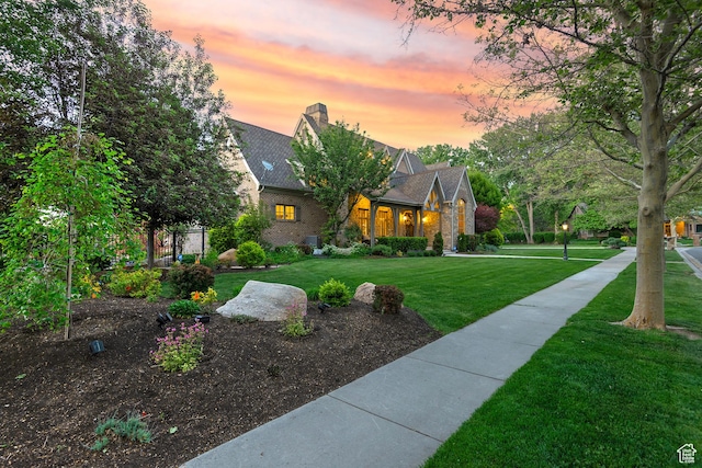 963 E Old English Rd, Draper, UT 84020 - view of front facade with a lawn, brick siding, and a chimney