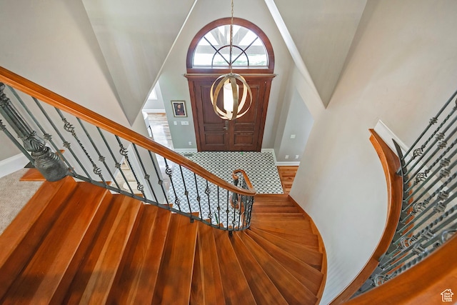 963 E Old English Rd, Draper, UT 84020 - foyer featuring high vaulted ceiling, stairs, and baseboards