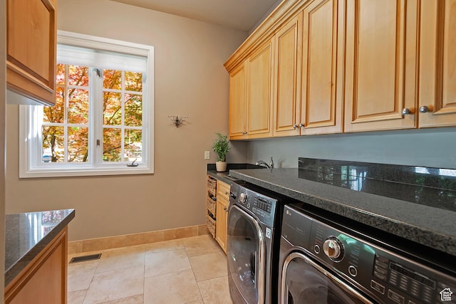 963 E Old English Rd, Draper, UT 84020 - laundry area with separate washer and dryer, baseboards, cabinet space, and light tile patterned floors