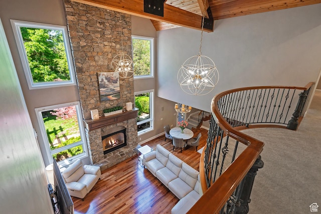 963 E Old English Rd, Draper, UT 84020 - living area featuring a chandelier, a fireplace, wood finished floors, high vaulted ceiling, and wood ceiling with exposed beams