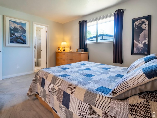 2567 W 2975 S, West Valley City, UT 84119 - carpeted bedroom featuring ensuite bathroom and baseboards
