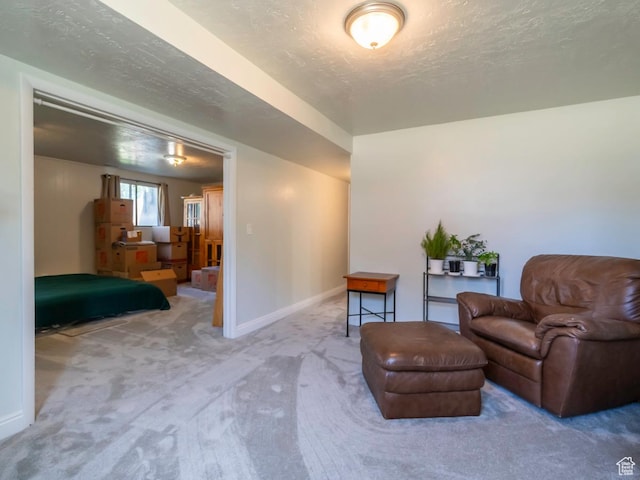 2567 W 2975 S, West Valley City, UT 84119 - living area featuring carpet flooring, baseboards, and a textured ceiling