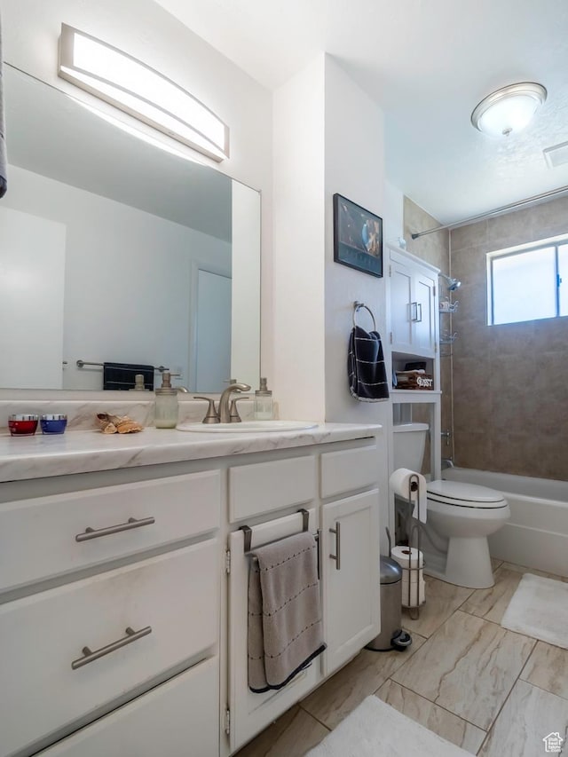 2567 W 2975 S, West Valley City, UT 84119 - full bath featuring vanity,  shower combination, toilet, and marble finish floors