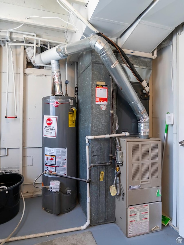 2567 W 2975 S, West Valley City, UT 84119 - utility room featuring water heater