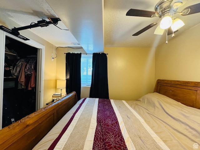 2552 W 2025 N, Clinton, UT 84015 - bedroom featuring a ceiling fan and a textured ceiling