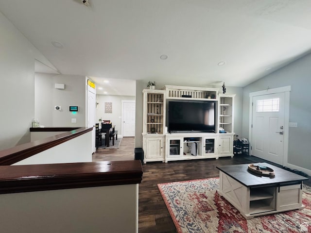 2552 W 2025 N, Clinton, UT 84015 - living room featuring dark wood-style floors, vaulted ceiling, baseboards, and recessed lighting