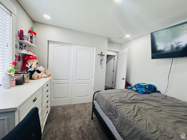 2552 W 2025 N, Clinton, UT 84015 - bedroom featuring dark carpet, a closet, and recessed lighting