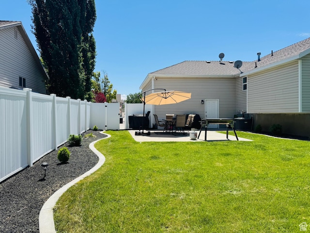 2552 W 2025 N, Clinton, UT 84015 - view of yard featuring a patio
