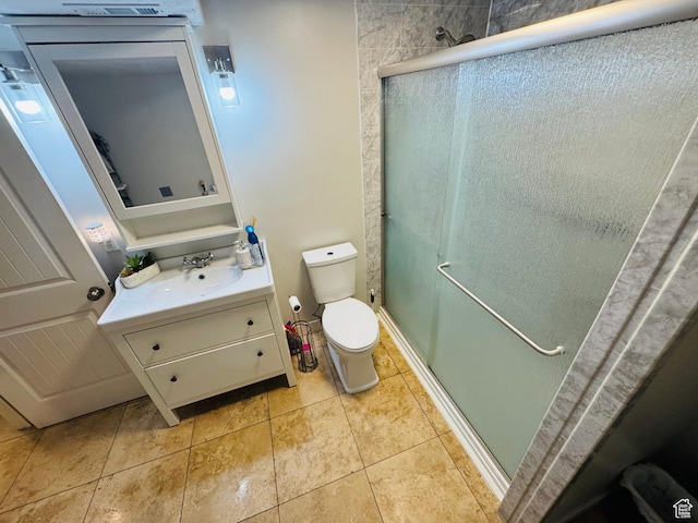 2552 W 2025 N, Clinton, UT 84015 - bathroom featuring vanity, a shower stall, toilet, and tile patterned floors