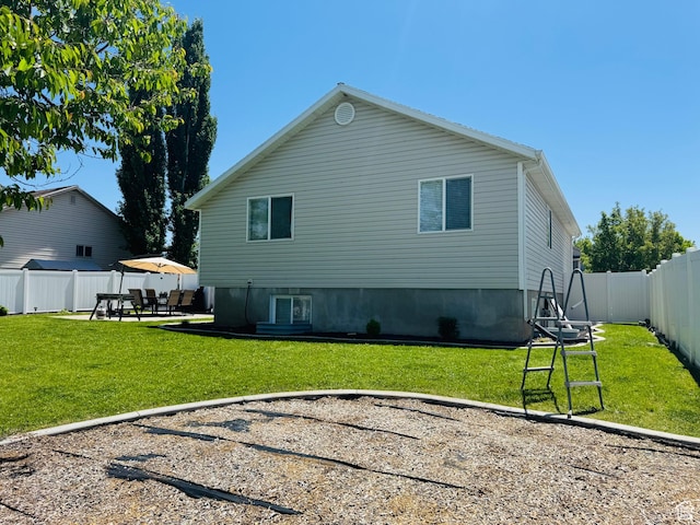2552 W 2025 N, Clinton, UT 84015 - rear view of house with a patio area and central AC unit