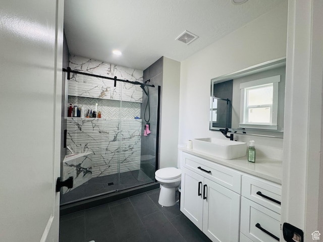 2552 W 2025 N, Clinton, UT 84015 - bathroom with vanity, toilet, a stall shower, and tile patterned flooring