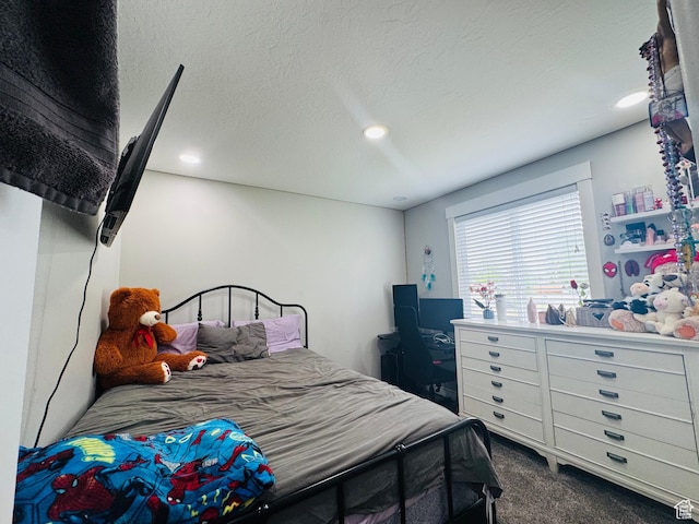2552 W 2025 N, Clinton, UT 84015 - bedroom with dark carpet and recessed lighting