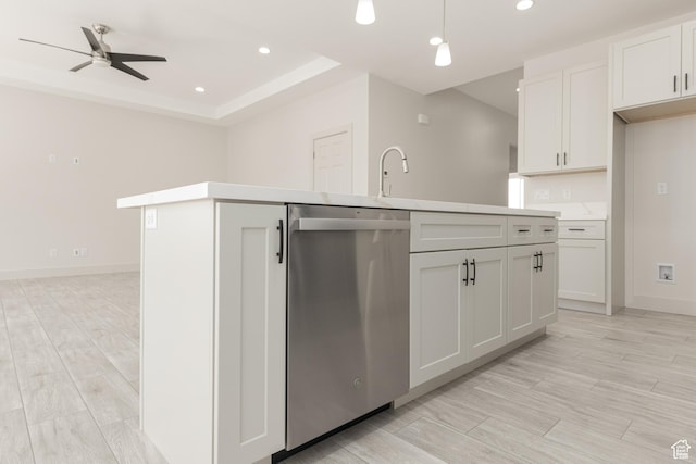 2175 W 320 S, Hurricane, UT 84737 - kitchen featuring stainless steel dishwasher, a center island with sink, recessed lighting, ceiling fan, and light countertops