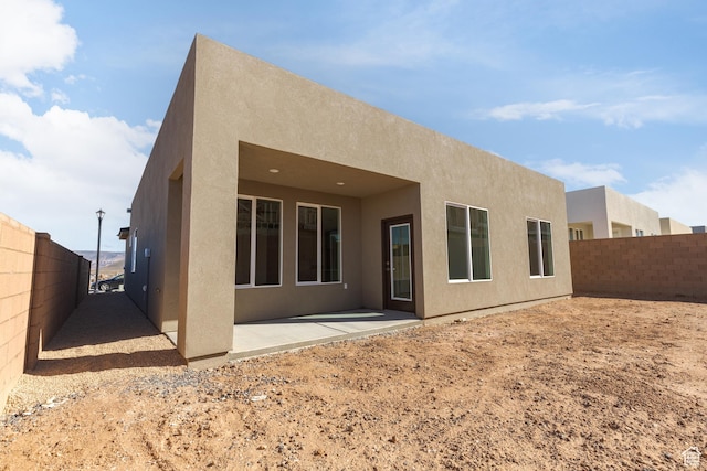 2175 W 320 S, Hurricane, UT 84737 - back of property with stucco siding and a patio area