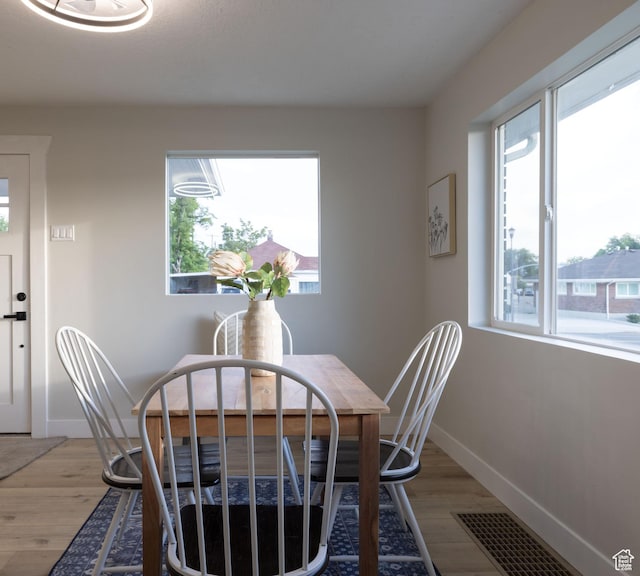 21 E 8680 S, Sandy, UT 84070 - dining space featuring light wood-type flooring and baseboards