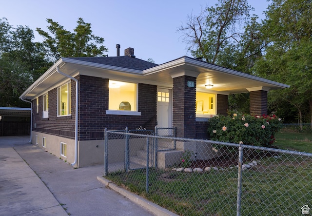 21 E 8680 S, Sandy, UT 84070 - ranch-style house featuring brick siding, a chimney, driveway, and covered porch