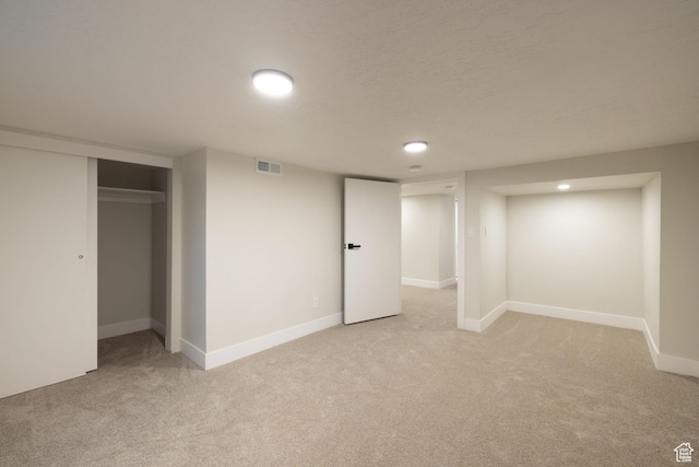 21 E 8680 S, Sandy, UT 84070 - finished below grade area with light colored carpet and baseboards
