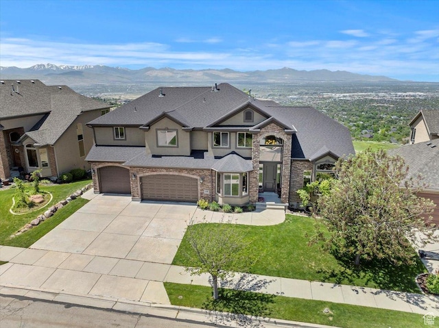 14248 Tumbleweed Way, Draper, UT 84020 - view of front of house featuring a mountain view, an attached garage, driveway, and a front yard