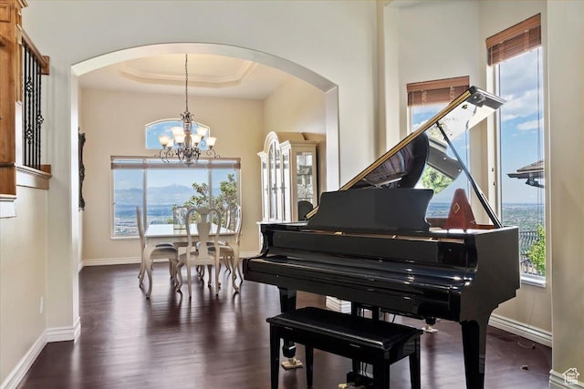 14248 Tumbleweed Way, Draper, UT 84020 - living area with arched walkways, a chandelier, and plenty of natural light