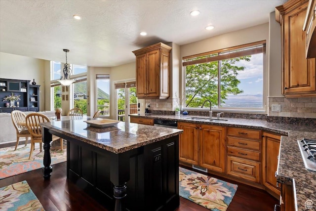14248 Tumbleweed Way, Draper, UT 84020 - kitchen with a sink, dark wood-style flooring, brown cabinets, and recessed lighting