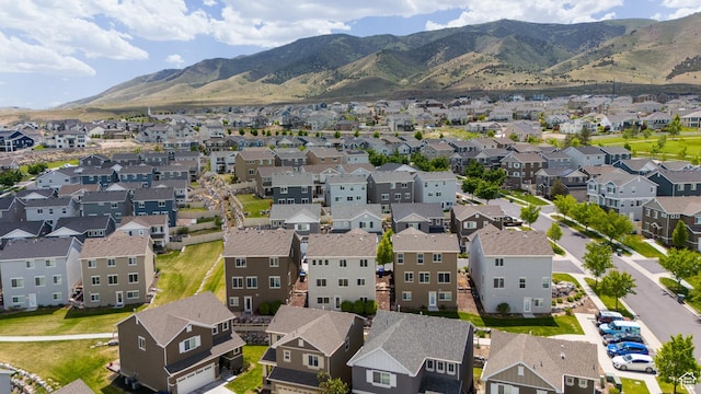 2956 S Willow Creek Dr, Saratoga Springs, UT 84045 - aerial view of residential area with a mountain backdrop