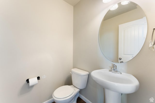 2956 S Willow Creek Dr, Saratoga Springs, UT 84045 - half bathroom featuring toilet and baseboards