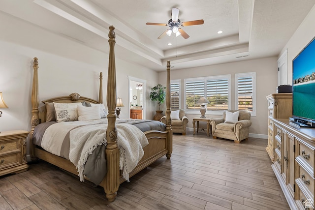 880 N 370 W, La Verkin, UT 84745 - bedroom featuring a raised ceiling, wood finished floors, baseboards, recessed lighting, and a ceiling fan