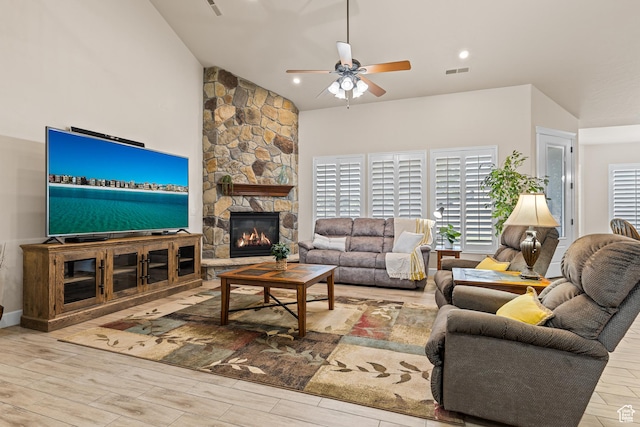 880 N 370 W, La Verkin, UT 84745 - living room with a ceiling fan, wood finished floors, lofted ceiling, and a stone fireplace