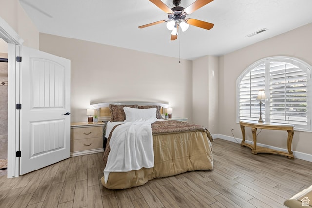 880 N 370 W, La Verkin, UT 84745 - bedroom with light wood-style floors, baseboards, and a ceiling fan