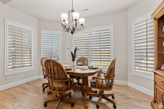 880 N 370 W, La Verkin, UT 84745 - dining space with a chandelier, light wood-type flooring, baseboards, and a desk