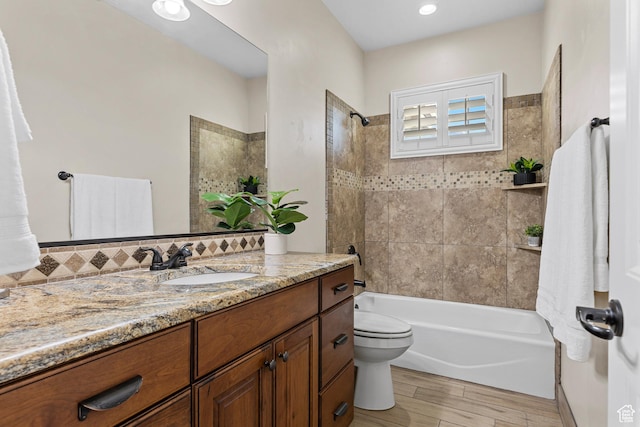 880 N 370 W, La Verkin, UT 84745 - full bathroom with vanity, toilet,  shower combination, and wood finished floors
