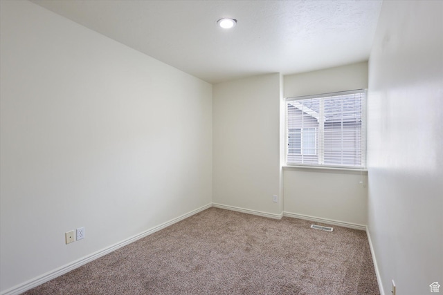 894 N Main St Unit 13, Orem, UT 84057 - spare room featuring carpet floors, baseboards, and recessed lighting