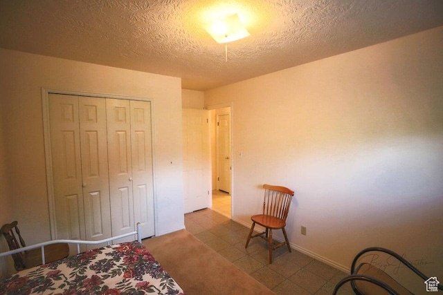 349 W 100 N, Pine Valley, UT 84781 - bedroom with a textured ceiling, a closet, and baseboards