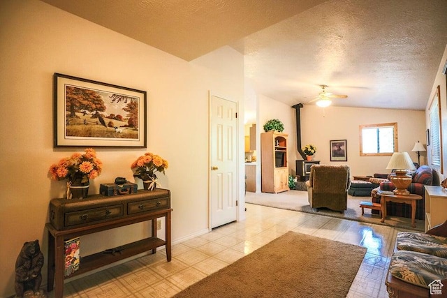 349 W 100 N, Pine Valley, UT 84781 - living area with vaulted ceiling, a textured ceiling, ceiling fan, light tile patterned floors, and baseboards