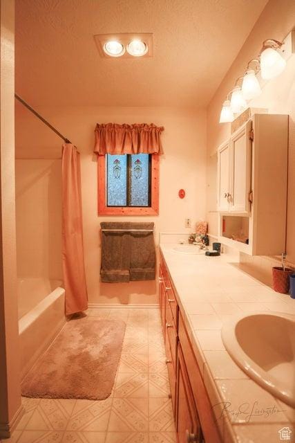 349 W 100 N, Pine Valley, UT 84781 - bathroom featuring double vanity and shower / bathtub combination with curtain