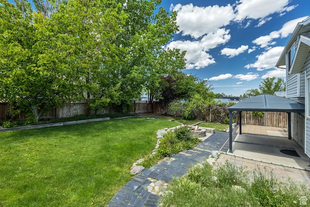 13928 S Ben Lomond Peak Dr W, Riverton, UT 84096 - view of yard with a fire pit, a gazebo, and a patio
