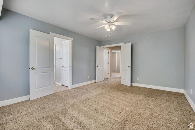 13928 S Ben Lomond Peak Dr W, Riverton, UT 84096 - unfurnished bedroom with carpet floors, baseboards, and ceiling fan