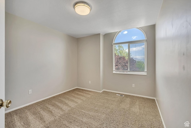13928 S Ben Lomond Peak Dr W, Riverton, UT 84096 - spare room featuring carpet and baseboards