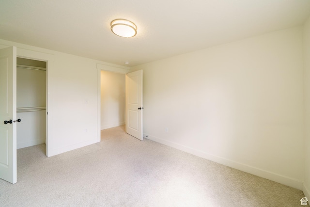 988 E 1300 S, Provo, UT 84606 - unfurnished bedroom featuring light carpet, a closet, and baseboards