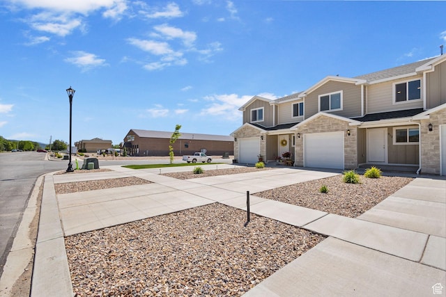 917 N 100 W, Nephi, UT 84648 - view of front facade featuring concrete driveway and an attached garage