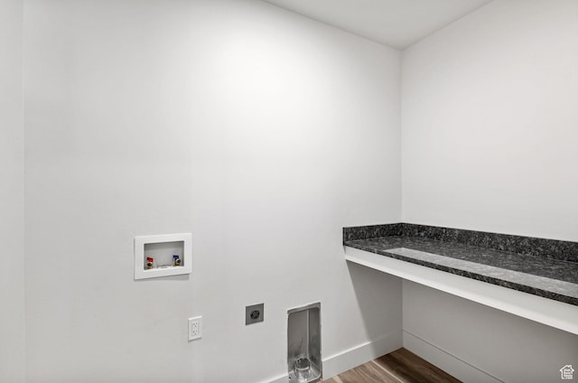 917 N 100 W, Nephi, UT 84648 - washroom featuring hookup for an electric dryer, washer hookup, dark wood-style floors, baseboards, and a desk