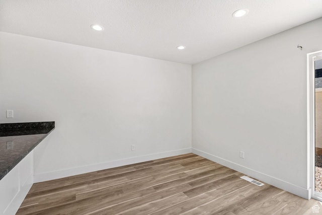 917 N 100 W, Nephi, UT 84648 - unfurnished dining area featuring light wood-style flooring, baseboards, and recessed lighting