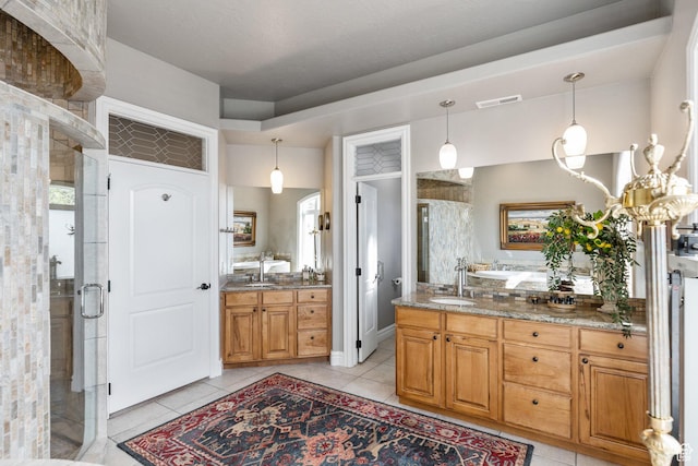 2204 N Bridge Water Rd, Cedar City, UT 84721 - full bathroom featuring a stall shower, vanity, and tile patterned floors