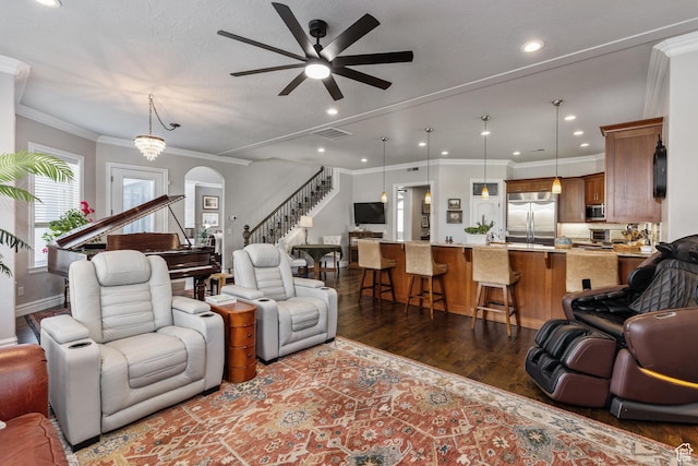 2204 N Bridge Water Rd, Cedar City, UT 84721 - living area with dark wood-type flooring, a ceiling fan, stairs, recessed lighting, and arched walkways