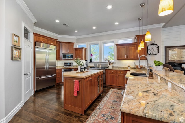 2204 N Bridge Water Rd, Cedar City, UT 84721 - kitchen featuring built in appliances, a sink, ornamental molding, tasteful backsplash, and brown cabinets