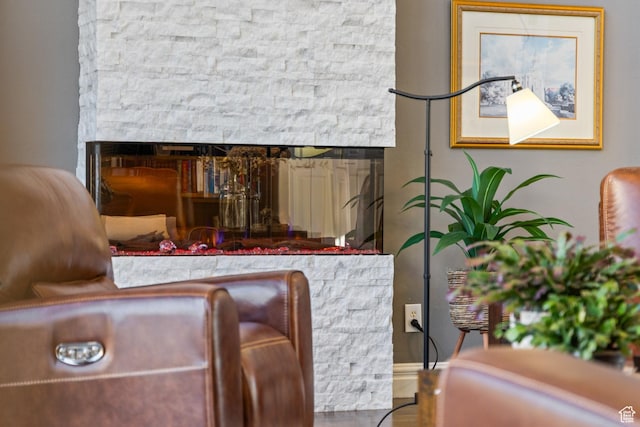 2204 N Bridge Water Rd, Cedar City, UT 84721 - sitting room featuring a multi sided fireplace