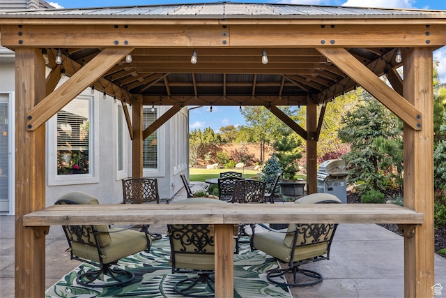 2204 N Bridge Water Rd, Cedar City, UT 84721 - view of patio / terrace with a gazebo, outdoor dining space, and a grill